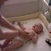 View the image: Laughing in crib