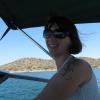 View the image: Driving a Boat